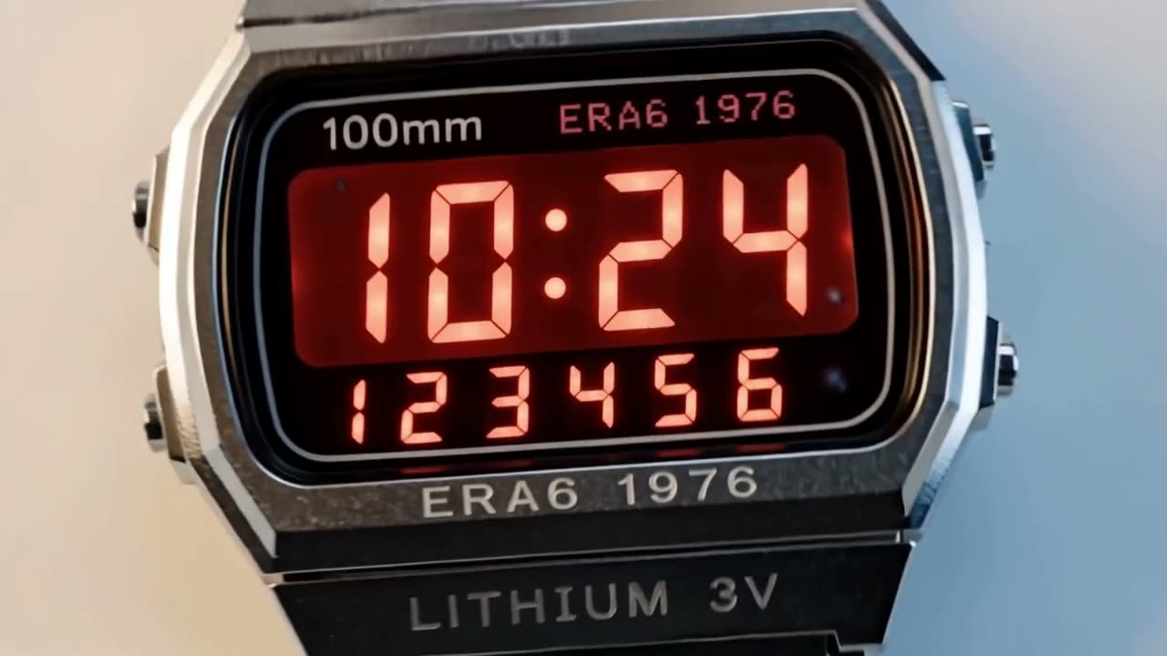 A digital watch lit by a small lithium cell